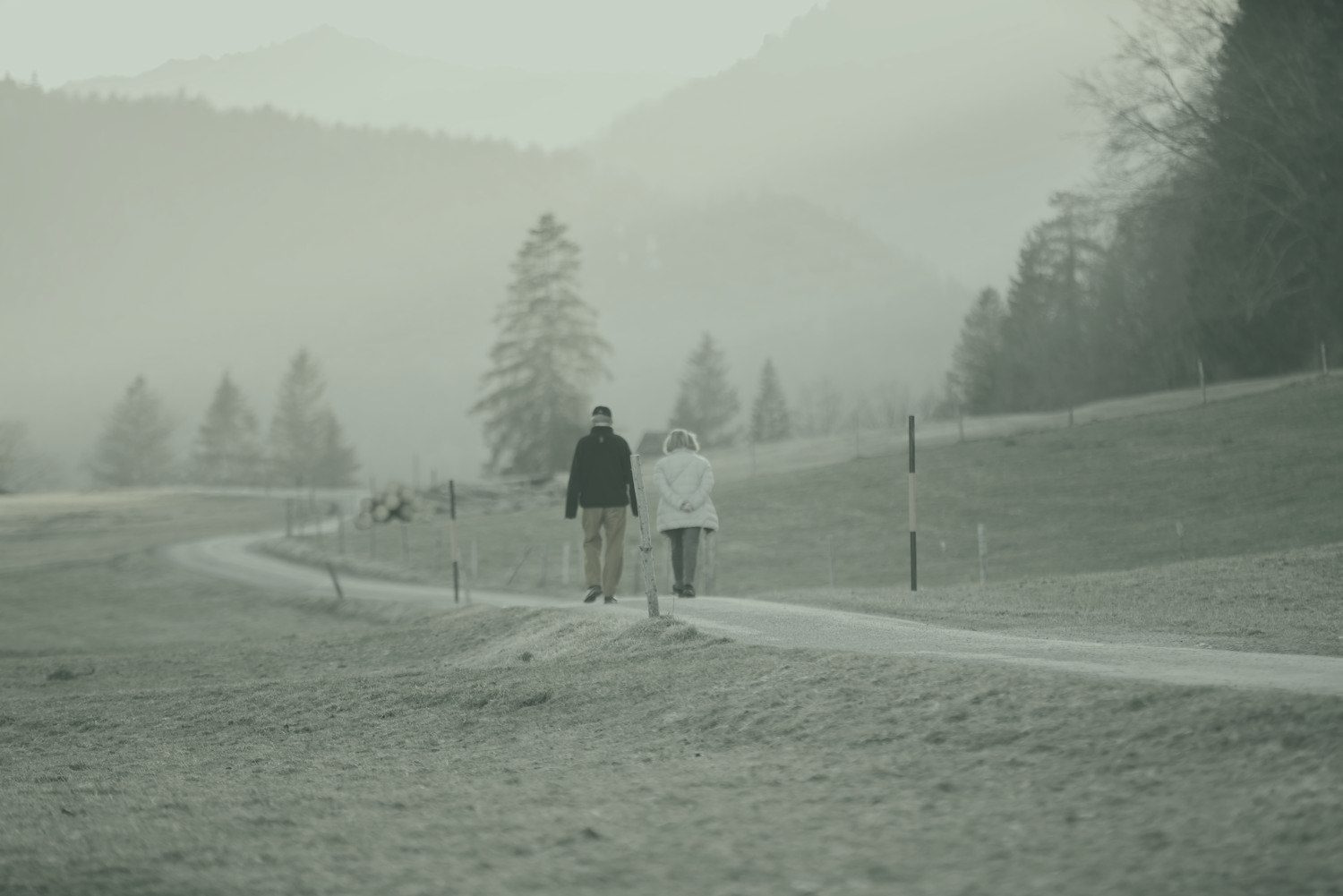 A couple walking together outdoors